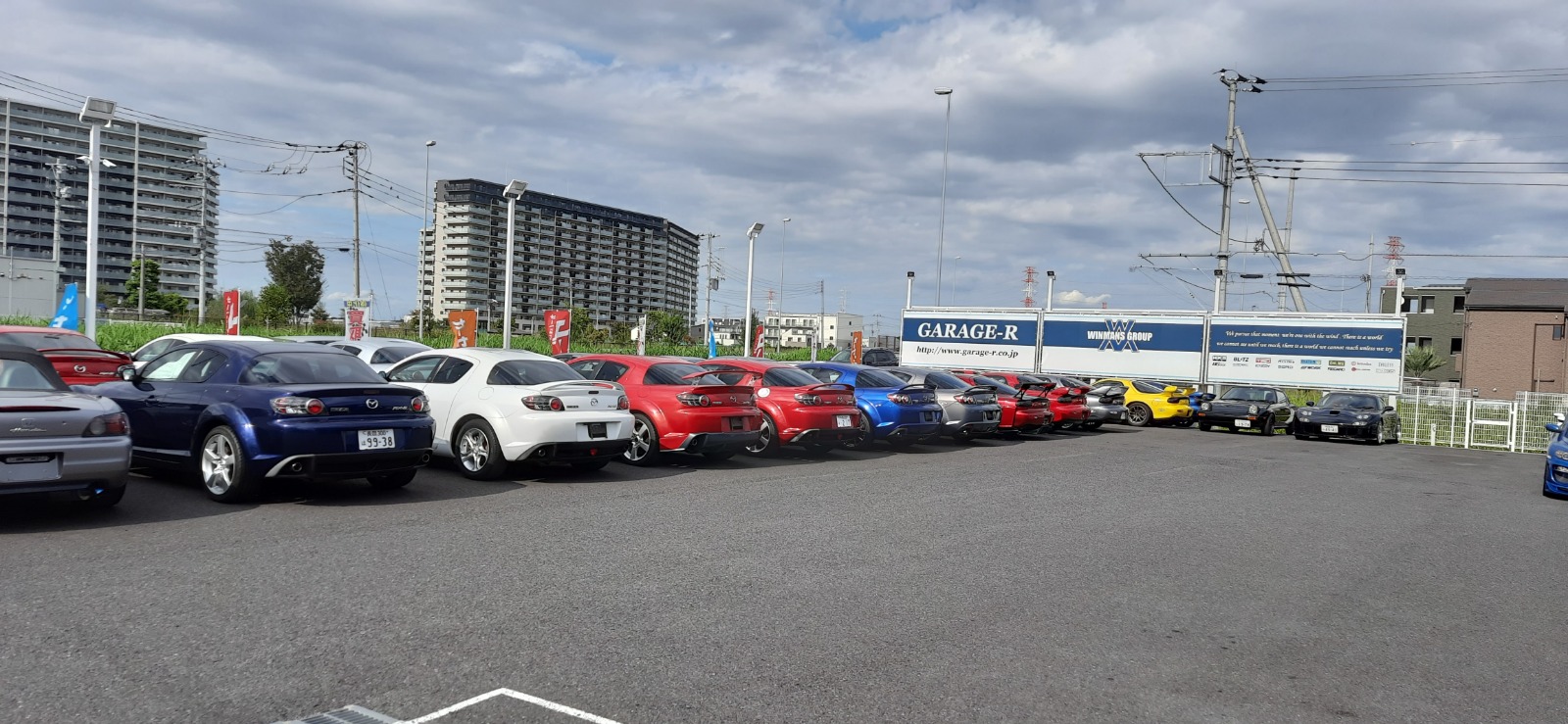 A row of Mazda RX-8s for sale at Garage-R