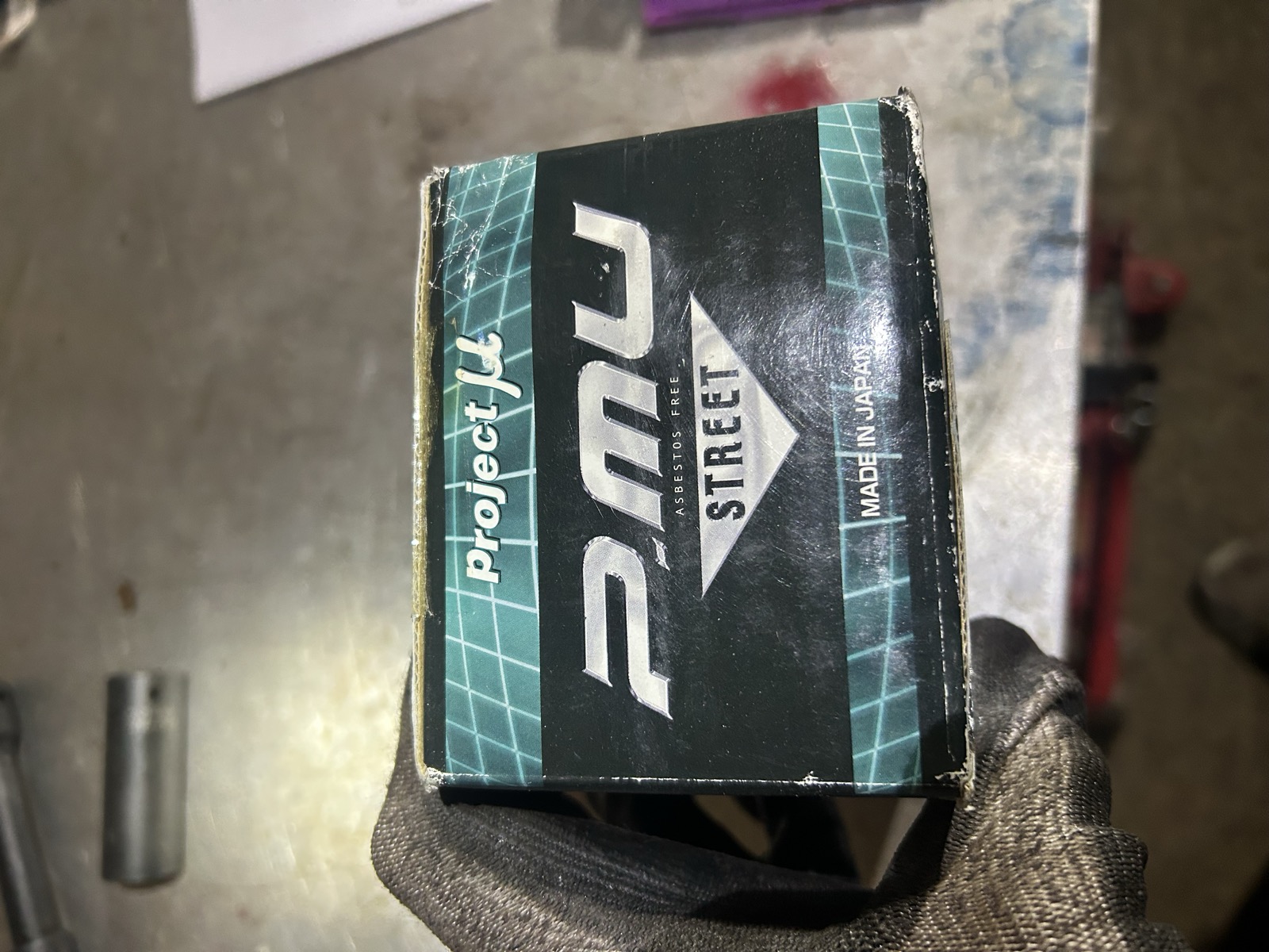 A box of Project Mu Street brake pads